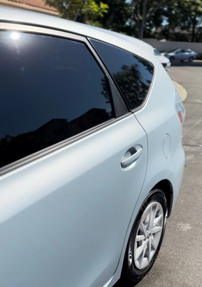 Freshly tinted vehicle window with showroom-quality finish